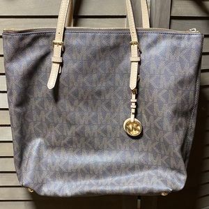 Authentic Michael Kors purse in good condition.